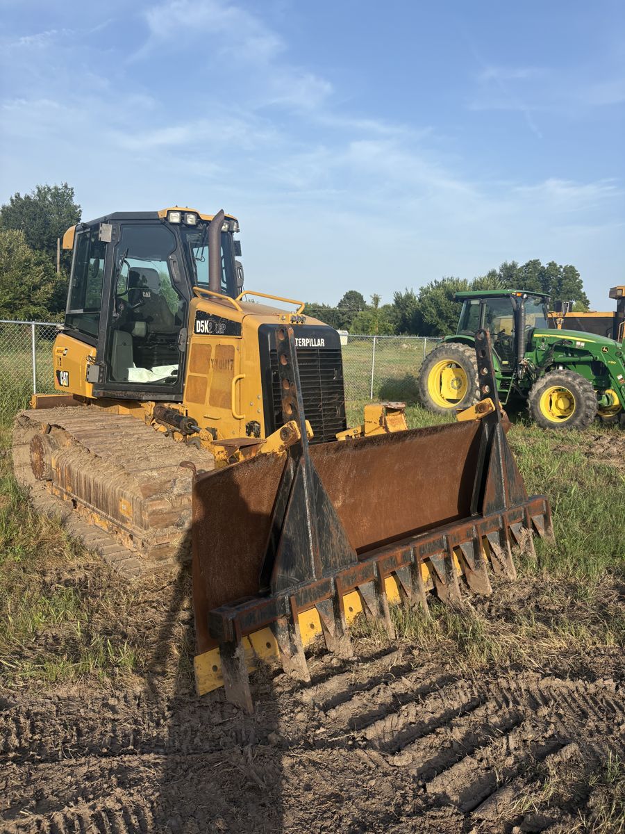 Cat D5K2 LGP dozer with root rake